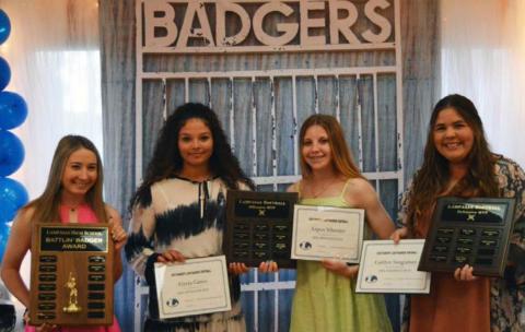 Award winners at the Lady Badgers’ softball banquet on Wednesday include, left to right, Battlin’ Badger Rose McAnally, co-Offensive MVPs Alycia Cantu and Aspen Wheeler, and Defensive MVP Caitlyn Sanguinet. JV team awards went to Offensive MVP Addison Berry, co-Defensive MVPs Karissa Perez and Daecee Ellis, and the JV Heart Award to Emma Lopez. JEFF LOWE | DISPATCH RECORD