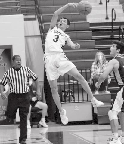 Jacob Hogeda makes a save at the baseline in the second half against Lago Vista. JEFF LOWE | DISPATCH RECORD