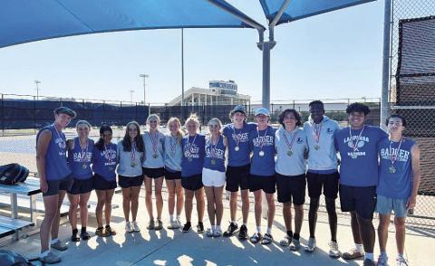 COURTESY PHOTO | KENNETH PEISER The tennis team poses for a photo after competing last Friday.