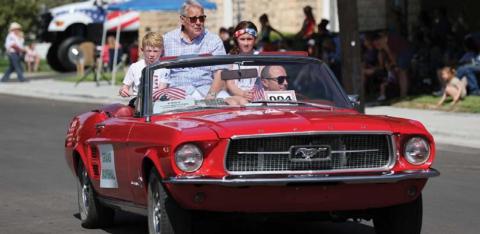 Parade marshal rides in style