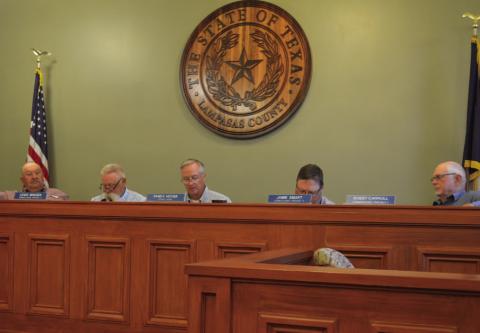 County officials discuss funding for the Hill Country Transportation District, known as “the HOP,” during Monday’s Commissioners Court meeting. ERICK MITCHELL | DISPATCH RECORD