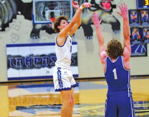 Nate Borchardt shoots over a Whitney defender in the Badgers’ home game last month. HUNTER KING | DISPATCH RECORD