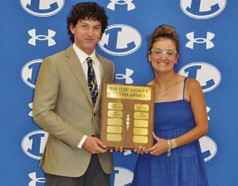 Elijah Copeland, left, and Caroline White won the Battlin’ Badger award for the 2025-2026 season. COURTESY PHOTO | KENNETH PEISER