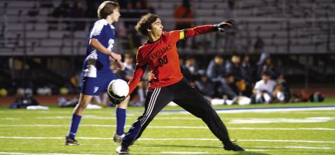 Michael Clayton throws the ball out to a teammate after making a save against Stephenville. HUNTER KING | DISPATCH RECORD