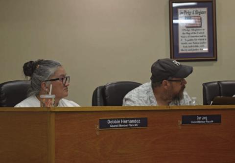 Kempner City Council members Debbie Hernandez and Dan Long look on during the council meeting held on July 23. ERICK MITCHELL | DISPATCH RECORD