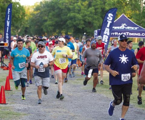 HUNTER KING | DISPATCH RECORD More than 400 total runners signed up to participate in the Spring Ho races last week.