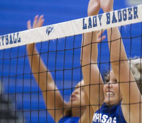 Laurcy Bender goes up for a block during Friday’s scrimmage in Lampasas. HUNTER KING | DISPATCH RECORD