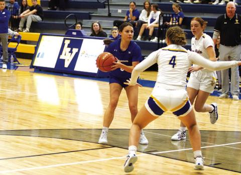 HUNTER KING | DISPATCH RECORD Chloe Thorp looks for a teammate to pass to during Tuesday’s game against Lago Vista.