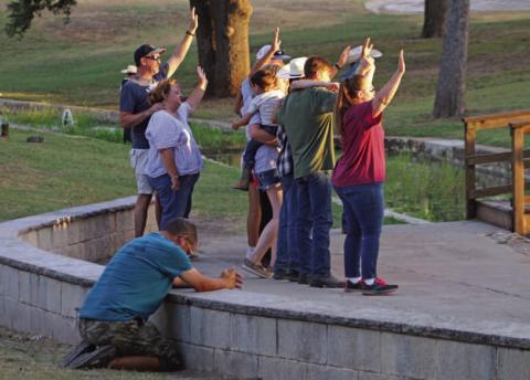 Members of the crowd at W.M. Brook Park were moved by the various performances during Gospel Night on Wednesday. MASON HINES | DISPATCH RECORD