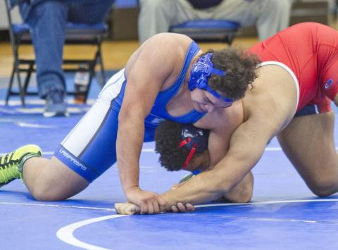 Anthony Harris, left, won all three matches at home on Saturday, including this one against Georgetown East View. JEFF LOWE | DISPATCH RECORD