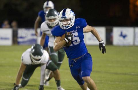 HUNTER KING | DISPATCH RECORD Case Brister breaks loose in the Taylor secondary during the Badgers’ 70-20 win last Friday.