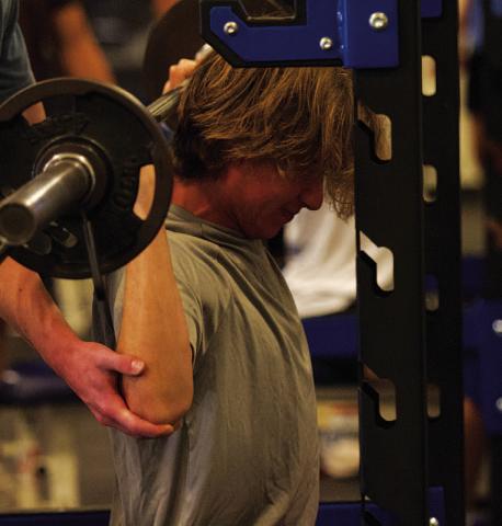 HUNTER KING | DISPATCH RECORD Jax Pratus lifts weight on the final Monday of SWAT for the summer.