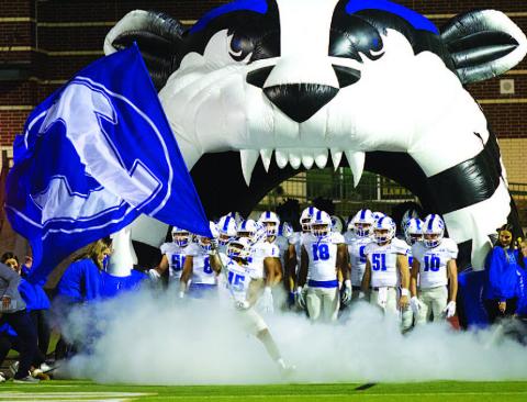The Badgers emerge from the tunnel to begin each game. They will hit the field in Boerne tonight in the same fashion. HUNTER KING | DISPATCH RECORD