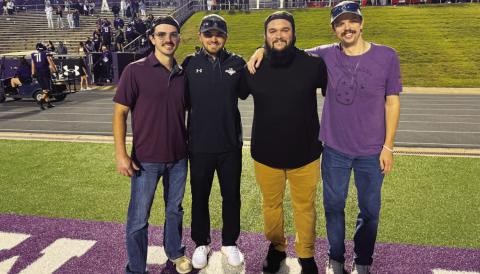 From left, Kord Davis, Derek Whoolery, Pattrick Vasquez and Hunter King pose for a photo after the football game. COURTESY PHOTO