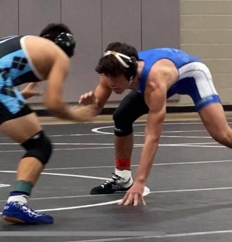 Landon DiBattiste posted a winning record for the day as the Badgers wrestled in College Station. LAURA MARTELL | COURTESY PHOTO