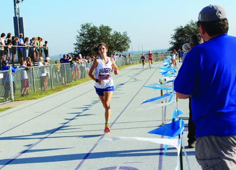 Nyla Long heads to the finish line where she crossed it in fourth place at the district meet. COURTESY PHOTO