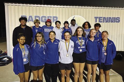 Lampasas tennis poses with their medals from the Liberty Hill tournament. COURTESY PHOTO | KENNETH PEISER
