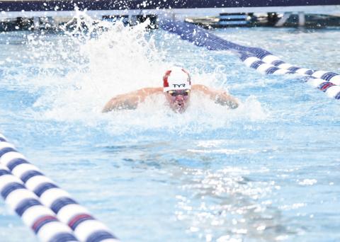 Jase Pinckney swims in the 100-yard butterfly, the event he will be competing in at the Olympic trials. COURTESY PHOTO