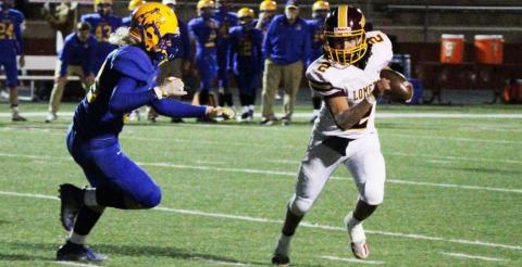 Tim Juarez runs past a Medina defender as the Hornets won their first playoff game since 2011. JESSICA MALDONADO | DISPATCH RECORD