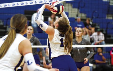 HUNTER KING | DISPATCH RECORD Ava Dowdy sets up a teammate during the match against Jarrell.
