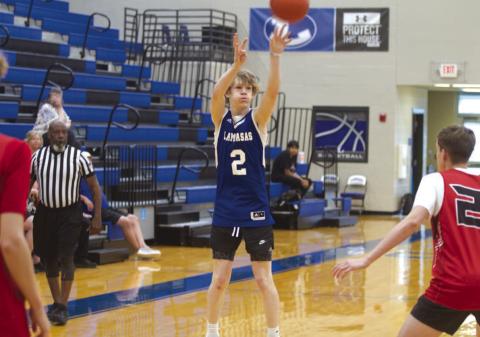 Peyton Sisson shoots over a Salado defender in game one on the final day of spring league. HUNTER KING | DISPATCH RECORD