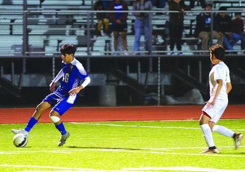 Jose Gomez dribbles down the right wing before putting a ball into the box. HUNTER KING | DISPATCH RECORD
