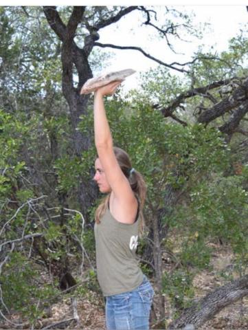 A “waiter’s hold” is a press and hold overhead with a single hand. Flat objects like books, pans or even a flat rock present a challenge to the stabilizing muscles of the shoulder. Alexandria Randolph | dispatch record