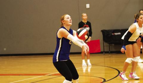 Caitlyn Bengsch makes a pass to a teammate during an earlier match.