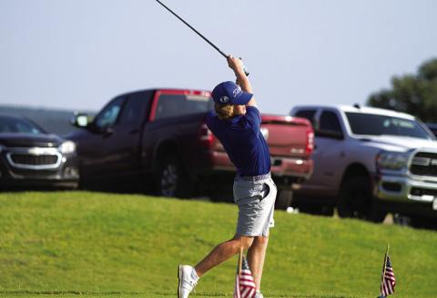 HUNTER KING | DISPATCH RECORD Nick Haas tees off on the first hole of his second round of the state golf tournament on Tuesday.