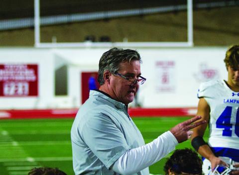 HUNTER KING | DISPATCH RECORD Head coach Troy Rogers addresses his team after the loss last Friday night.