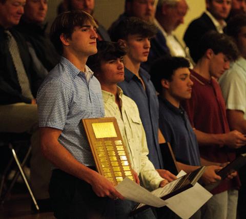 Bryson Roberts, left, stands with the Battlin’ Badger award from last Monday night. HUNTER KING | DISPATCH RECORD