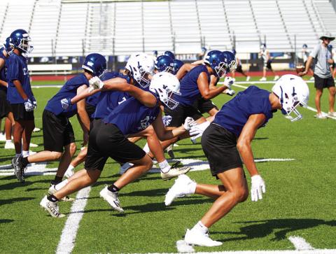 All the practices in temperatures over 100 degrees has led up to tonight when the Badgers take the field in the season opener. HUNTER KING | DISPATCH RECORD
