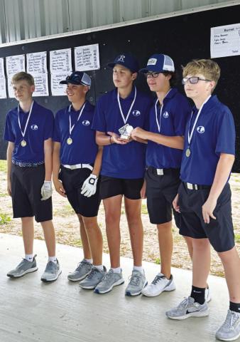 From left, Jem Moore, Noah Harrell, Henry Shahan, Brayden Brewer and Zane Nelson pose with their district championship trophy. COURTESY PHOTO