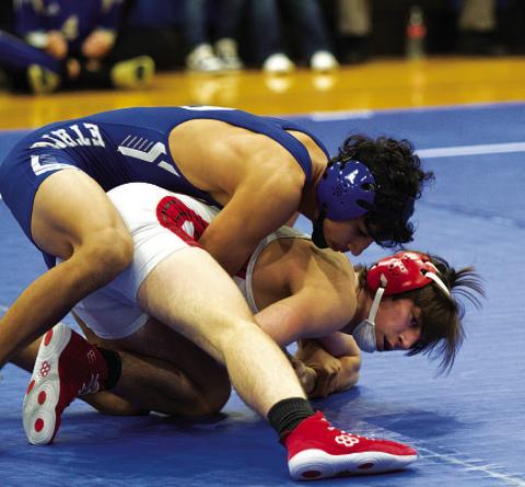HUNTER KING | DISPATCH RECORD Taylor Martell won her match via pin on Wednesday night.