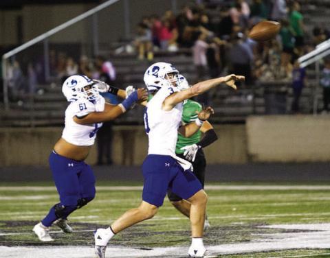 Reed Jerome launches a pass to Jaden McElwain for the game-winning touchdown. HUNTER KING | DISPATCH RECORD