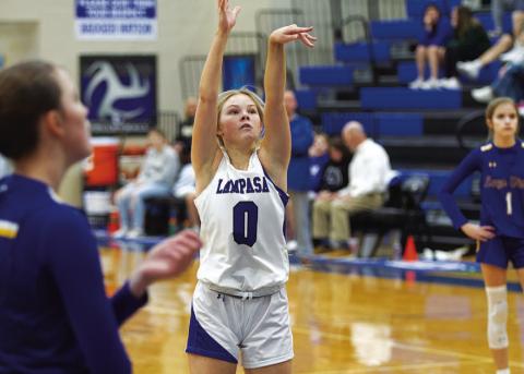 FILE PHOTO Addison Borchardt and the Lady Badger basketball team will begin their season with a scrimmage in Hutto on Saturday. The varsity will start at 1 p.m.