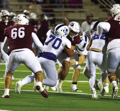 Cameron Russell makes a tackle during last week’s win over Uvalde. HUNTER KING | DISPATCH RECORD