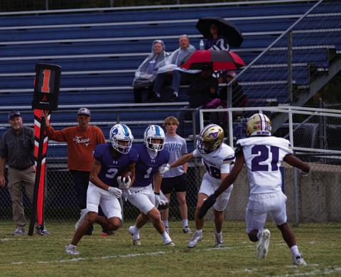 Tripp Stinnett evades Marble Falls defenders to get to the goal line for his touchdown. HUNTER KING | DISPATCH RECORD