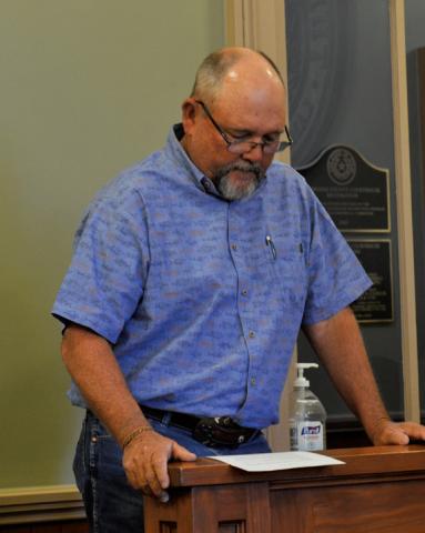 Hill Country 100 Club Director Jim Lindeman highlights the organization’s efforts in a presentation during last week’s Lampasas County Commissioners Court meeting. erick mitchell | dispatch record