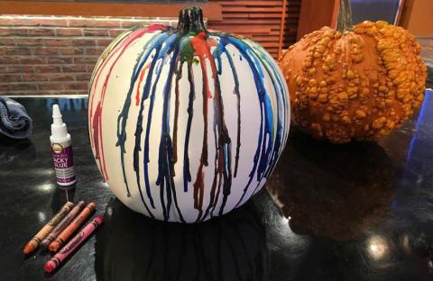 Extend the life of pumpkins by creating crayon-dripped decorations rather than carving them. photo | melindamyers.com