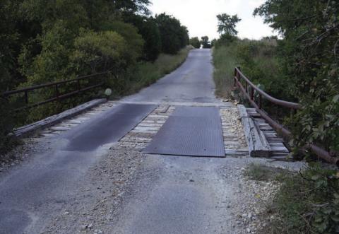 Work on this bridge over Little Lucy Creek in Precinct 3 has made the roadway passable, but County Commissioner Shad Hill still has plans to seek a replacement structure on County Road 2207. ERICK MITCHELL | DISPATCH RECORD