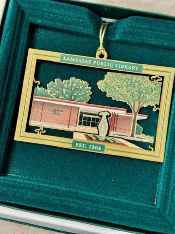 These specially designed ornaments feature a cut-out image of the entrance of Lampasas Public Library. Ornaments are on sale while supplies last. courTesy photo | lampasas public library