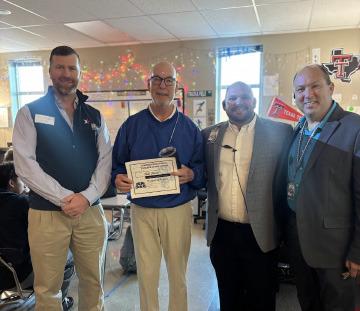 For the month of November, Lampasas High School celebrated its Teacher of the Month Bob Davis, second from left. On hand to honor Davis is Clay Phillips, left, of Texas Farm Bureau Insurance; Assistant Principal Ryan Race and Principal Paul Weinheimer. Race said Davis “is an exceptional old-school English teacher who reaches all students with his kindness and his consistency.” COURTESY PHOTO
