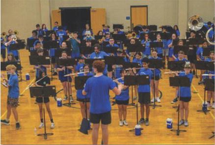 Band students practice indoors during summer camp in preparation for the marching season this fall. courtesy photo | rachel k gill photography