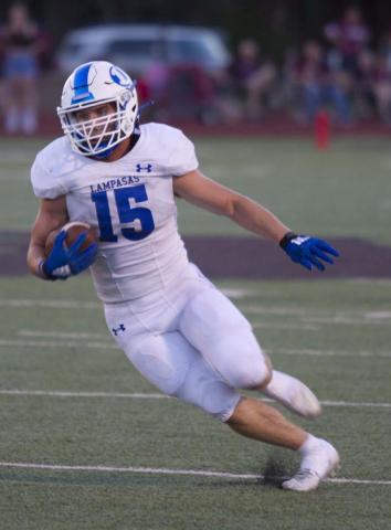 Case Brister darts through the Brownwood defense on his way to almost 200 yards rushing Friday night. HUNTER KING | DISPATCH RECORD