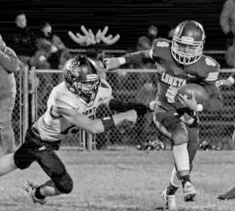Tim Juarez evades an Evant defender during district play. MEGAN LUSTY PHOTOGRAPHY | COURTESY PHOTO