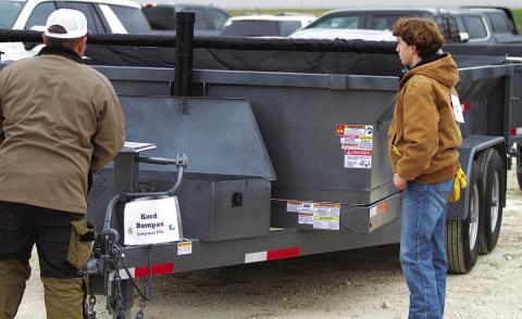 Kord Bumpus displays his 7-foot by 4-foot trailer at the Lampasas County Youth Livestock Show before judging, when he earned reserve grand champion honors. Bumpus said the trailer took more than 200 hours to complete. HUNTER KING | DISPATCH RECORD
