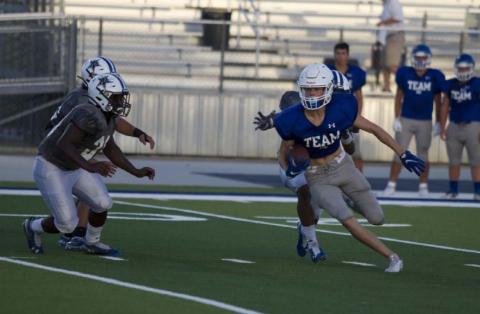Nate Borchardt darts through the Navasota defense after a catch over the middle. Borchardt finished with two touchdowns during the second tune-up for the Badgers. HUNTER KING | DISPATCH RECORD