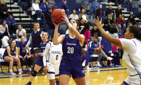 Ysa Swain shoots and scores for two of her eight points in Tuesday’s contest against Jarrell. HUNTER KING | DISPATCH RECORD