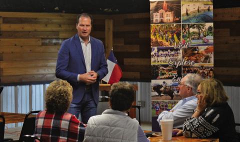 U.S. Rep. August Pfluger speaks to constituents Friday at Putters &amp; Gutters to provide an update on his Washington, D.C. legislative activities. ERICK MITCHELL | DISPATCH RECOARD